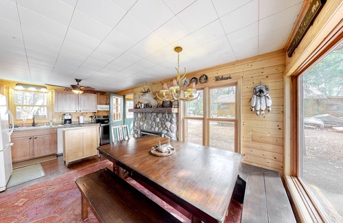Lac du Flambeau House | Lakefront home with dock, swimming area, & wood stove - sunset views