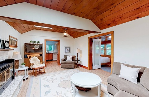Christina Lake Cabin | Lakefront home with dock, fireplace, washer/dryer, and mountain views - dogs OK