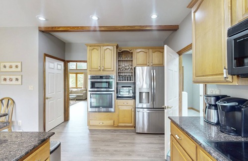 Livingston House | Lakefront home with Fiber Wifi, dock, private swim area & water toys - dog OK