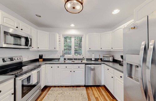 Windham House | Lakefront home with sunrise views, private dock, kayaks, paddle boards, WFH desk