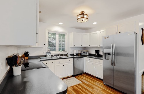 Windham House | Lakefront home with sunrise views, private dock, kayaks, paddle boards, WFH desk