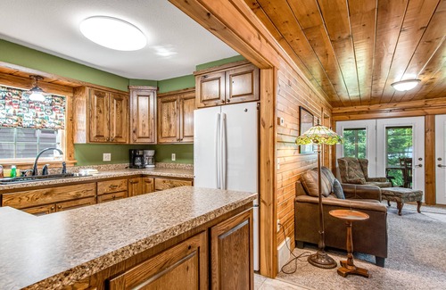 Arbor Vitae House | Lakefront home with dock, fireplace, deck, firepits & fast WiFi - dog-friendly