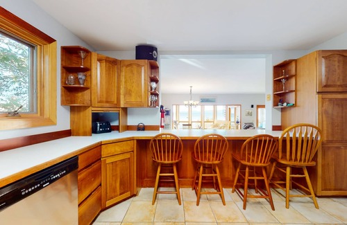Malletts Bay House | Lakefront home with water access, views of the mountains, private deck & patio