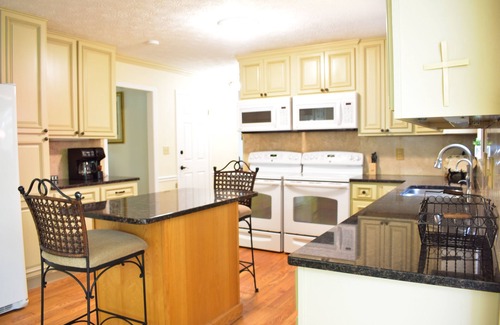 Gainesville House | Lakefront Home with a Single Slip Party Deck