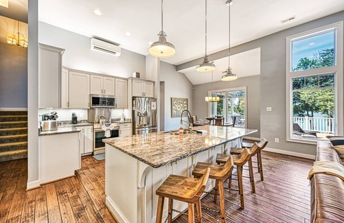 Bumpass House | Lakefront home with views, private hot tub, central AC, dock & waterslide