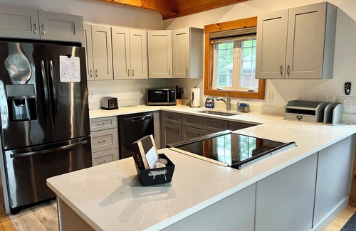 Wakefield House | Lakefront Home with Walk-Out Sandy Beach!