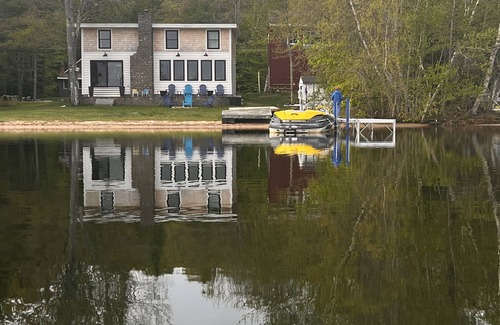 Raymond House | Lakefront Living. Kayak while bald eagles soar above and loons call out.