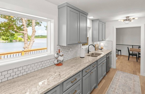 Bella Vista House | Lakefront, luxury beds, hot tub, fire pit, game room, private dock & boathouse.