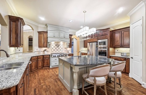 Wylie House | Lakefront Mansion with Pool and Cinema