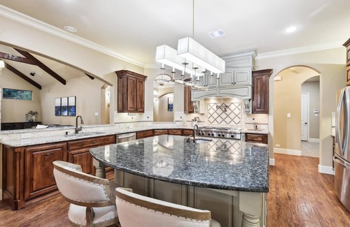 Wylie House | Lakefront Mansion with Pool and Cinema