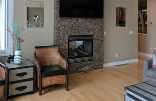 Grand Haven House | LAKEFRONT MASTER HOUSE with private sandy beach and fire-pit.