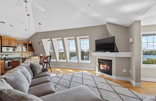 Elkhart Lake Condo | Lakefront Penthouse, Private Beach, Outdoor/Indoor Pools, Walk to Town