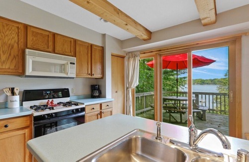 Honey Creek House | Lakefront |Private Sandy Beach & Pier |Blue Spring Lake |Fire Pit |Grill |Kayaks |Canoe |Paddle Boat