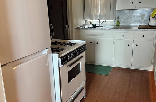 Brice Prairie Apartment | Lakefront studio. Natural setting, sunsets, kayaks, fishing dock, paved walking
