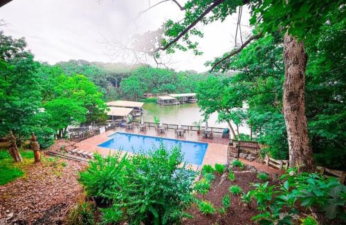 Village of Four Seasons House | Lakefront Treetop Village 3bd3badeckpool-6pp