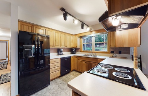 Norway House | Lakehouse home with private dock, firepit, grill, kayaks and canoes