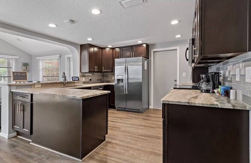 Palm Harbor House | Lakehouse Living w/Firepit and Boat Dock to relax and Enjoy the Sunset
