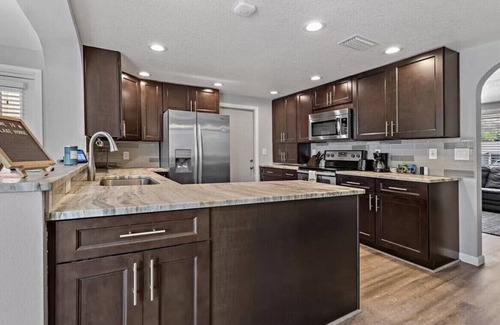Palm Harbor House | Lakehouse Living w/Firepit and Boat Dock to relax and Enjoy the Sunset