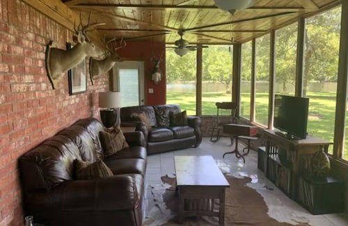 Montgomery House | Lakehouse on a small private lake situated on 1.2 acres of lakefront property.