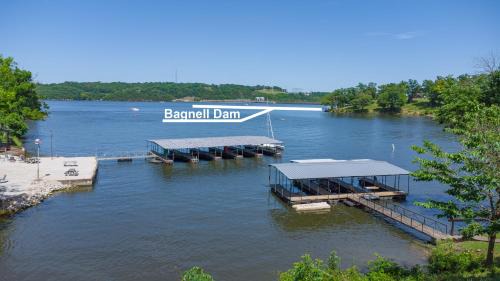 Lake Ozark House | Lakeshore Fishing Cabin 5, dock, boat slip and firepit area