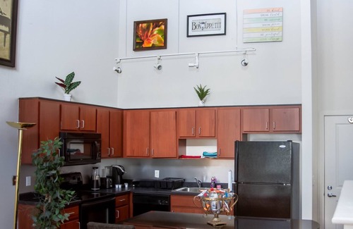 Lowry Hill East Condo | Lakeside Haven Minneapolis Loft with BBQ Area, Patio, Central AC, Games, W & D