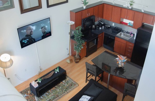 Lowry Hill East Condo | Lakeside Haven Minneapolis Loft with BBQ Area, Patio, Central AC, Games, W & D