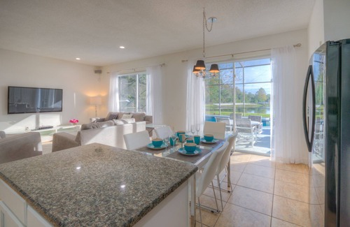 Lake Berkley Villa | Lakeside house, huge south facing pool with spa, lake view, & Disney at 8 miles