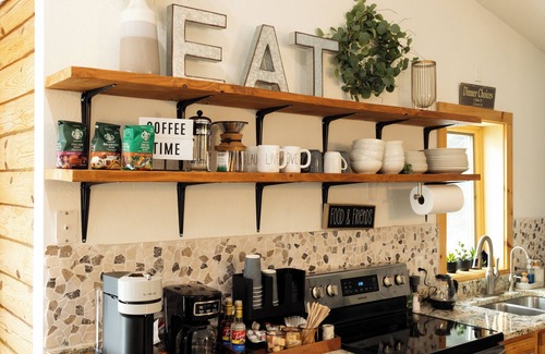 Baxter House | Lakeside Log Cabin w/Firepit, Dock, King Bed, Game Room, Scenic Relaxation