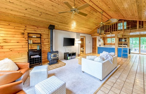 Blue Water House | Lakeside log home with a private deck, WiFi, firepit, central AC, & washer/dryer