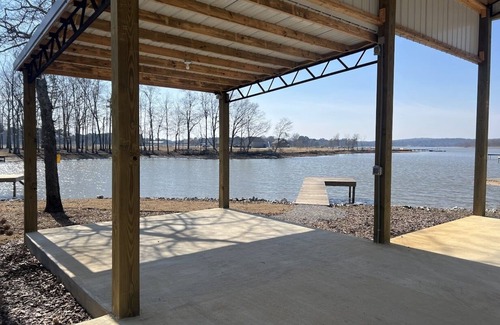 Lincoln House | Lakeside Luxury: Covered RV Site with Upgraded Patio and Private Pier