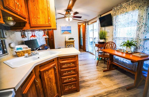Eddyville Cabin | Lakeside Place 1 (Sleeps 1-6) - Tiny living space with a queen bed, and 3 twin beds perfect for kids