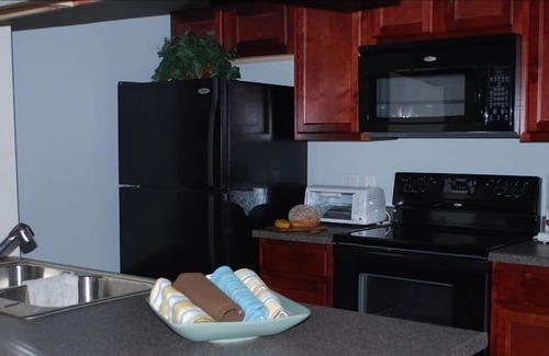 Foothills Condo | Lakeside, Poolside, Model-Furnished Condo