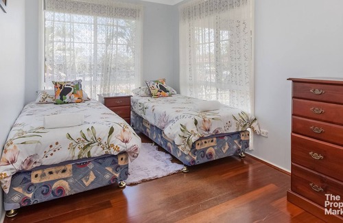 Buff Point House | Lakeside Retreat - Cheerful Family Home with Pool