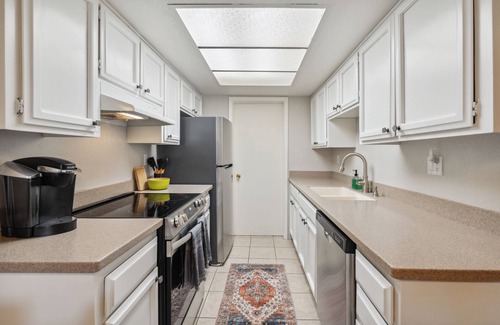Desert Shores Condo | LAKEVIEW CONDO! Walking Paths, Pickleball, Pool/Spa, Covered parking
