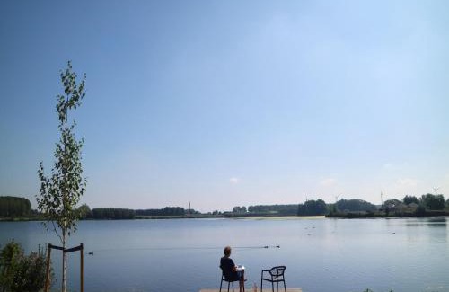 Municipality of Nissewaard House | Lakeview villa with swimming and fishing pier, cleaning included