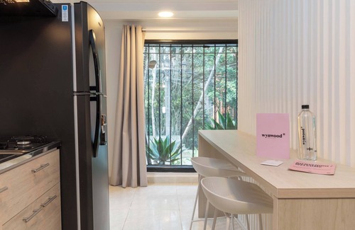 Las Lomas I Apartment | Lalinde by Wynwood House