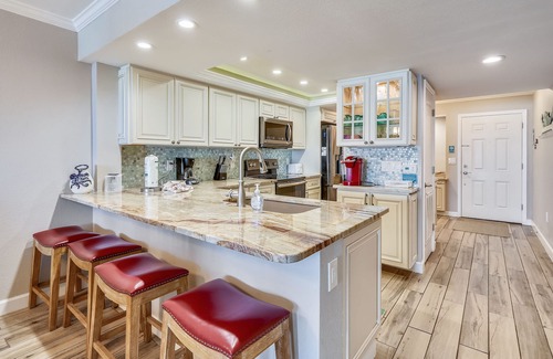 Sunset Beach Condo | Land's End 405 building 11 Beautifully updated|Private beach front balcony!