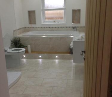 Wick House | Langley Cottage with patio, spacious rooms - part of Langley Serviced Apartments several properties in Wick