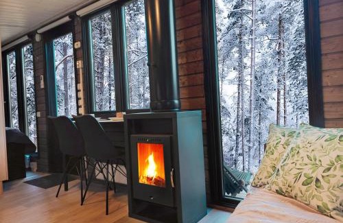 Kolari Ski Chalet | Lapland Riverside Cabin 4 HILLA , Ylläs, Tiny Home with Sauna, Fireplace, Terrace, BBQ, Wifi, Ski, Fishing, Pets OK