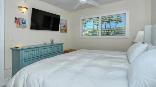 Longboat Key Apartment | LaPlaya 102E-Tropical garden view near the pool!