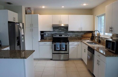 Interchange Square House | Large 4bd 2bth pool home with waterfall feature and private back yard!