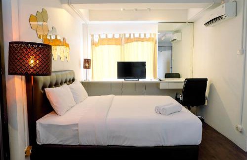 Jakarta Apartment | Large and Minimalist Studio at Pakubuwono Terrace Apartment By Travelio