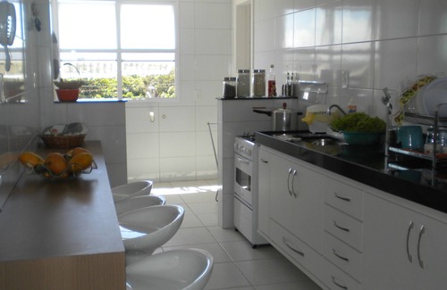 Enseada Azul Apartment | Large apartment facing beach Bacutia with 3 suites and gourmet balcony