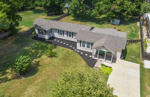 Tulsa House | Large backyard, minutes from Gathering Place