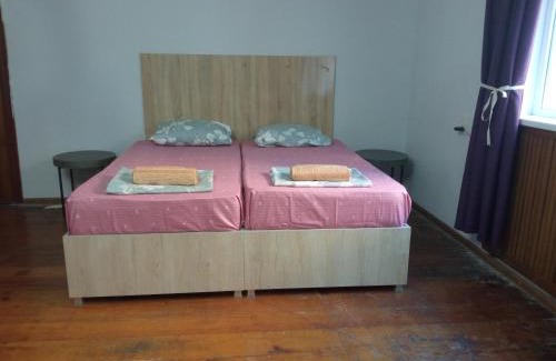 Zugdidi House | large bedroom with two separate beds