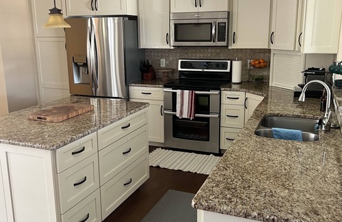 Cypress Lake House | Large family home with heated pool