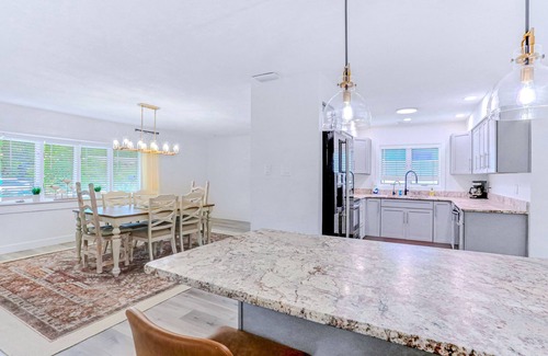 Seminole House | Large heated pool home with backyard oasis, dog friendly, AC and Wifi