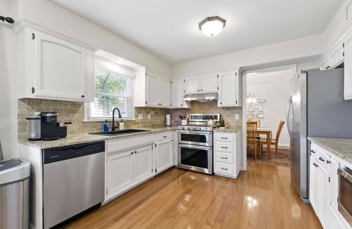 Overland Park House | Large Home in OP Fenced Yard King Beds GameRoom