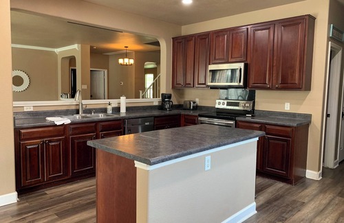 Taylor House | Large home in Taylor, Texas. Stay for a while. Community pool and playground