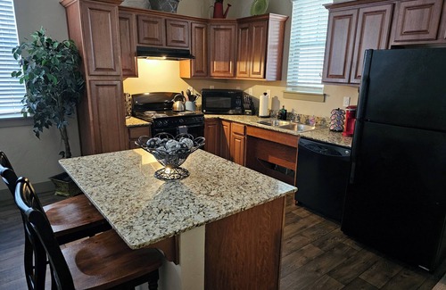 South Jordan Apartment | Large King Suite, Comfy Beds, Hot Tub, Gym, Wi-fi